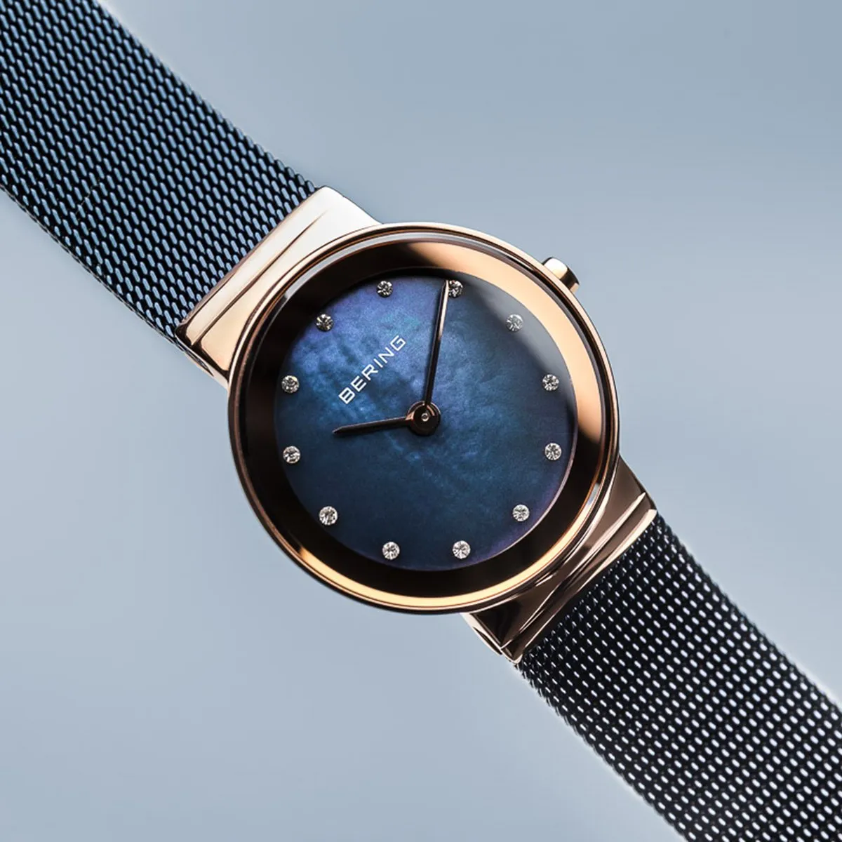 Bering Classic Polished Rose Gold Blue Mesh Swarovski Watch