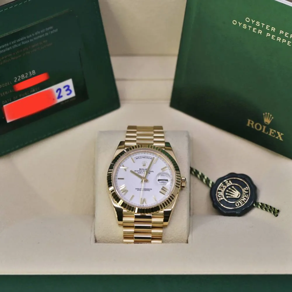 Rolex Day Date 40mm - Ref: 228238-0042 - White Roman Dial & Fluted Bezel, 18K Yellow Gold President Bracelet Men's Watch