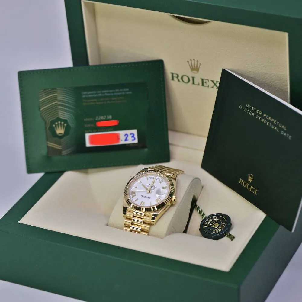 Rolex Day Date 40mm - Ref: 228238-0042 - White Roman Dial & Fluted Bezel, 18K Yellow Gold President Bracelet Men's Watch
