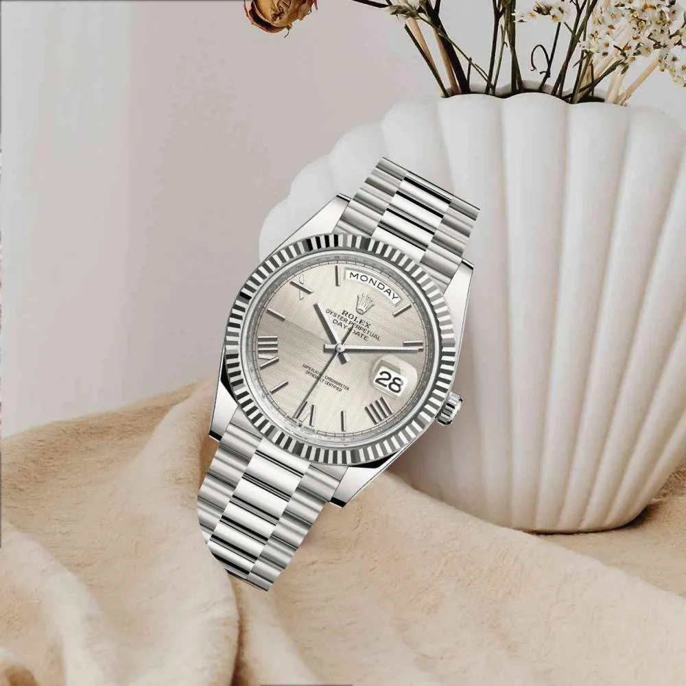 Rolex Day Date 40mm - Ref: 228239-0006 - Silver Quadrant Motif Roman Dial & Fluted Bezel, 18K White Gold President Bracelet Men's Watch
